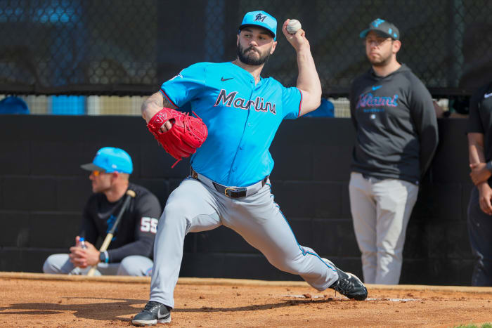 Feb 17, 2024; Jupiter, FL, USA; Miami Marlins relief pitcher Tanner Scott (66) delivers a pitch during a spring training workout at the Marlins Player Development & Scouting Complex.